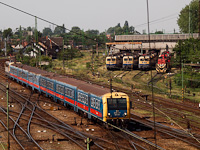 The MÁV-START BDt 451 is seen arriving at Szolnok from Budapest-Keleti