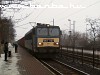 The V63 027 pulling a heavy freight train through Budafok-Belváros