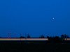 Egy gyorsvonat Tárnok és Martonvásár között a holdfogyatkozás idején a kora esti kék órában