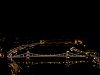 A Duna éjszaka a díszkivilágításban fürdő Lánchíddal és Margit-híddal