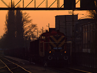 The MÁV-TR 448 401 (ex M44 401) at Kispest station by sunset