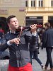 A violinists plays with big enthusiasm and success at Staréstmestské námésti in Prague
