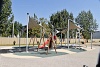 Playground at Reptár with a floor resembling a runway and neat sunscreens