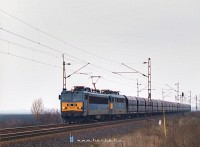 The V63 021 pulling an empty ore train with an additional V43 near Karácsond