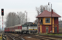 The ŽSSK 754 003-2 at Fülek (Fil'akovo, Slovakia) hauling fast train Domica