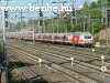An Sr2 locomotive is pulling her IC train to Helsinki