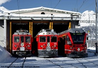 Three generations of Berninabahn railcars at Poschiavo depot