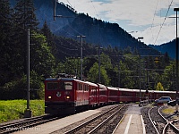 The RhB Ge 6/6<sup>II</sup> 707 is hauling a passenger train as it is its original duty - photo taken at Versam-Safien station