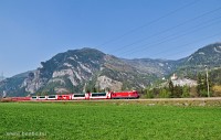 The RhB Ge 4/4<sup>III</sup> 644 <q>Savognin</q> between Rothenbrunnen and Rodels-Realta with the Glacier-Express