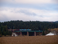 Three unidentified ŽSSKC 736s  seen hauling a freight train between Čremošné and Horná Štubňa obec