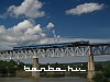 2M62-1114 egy DPL-vonattal a Zaliscsiki Dnyeszter-hídon