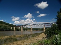 The DPL train headed by 2M62-1114 over the river Dniester near Zalischyky