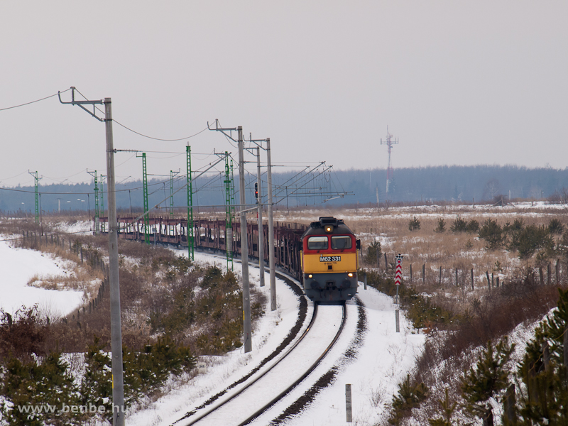 The M62 331 is pulling an empty car transporter train between Őriszentpéter and Nagyrákos photo