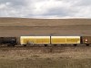 Transwaggon side-swivel wall twin freight car
