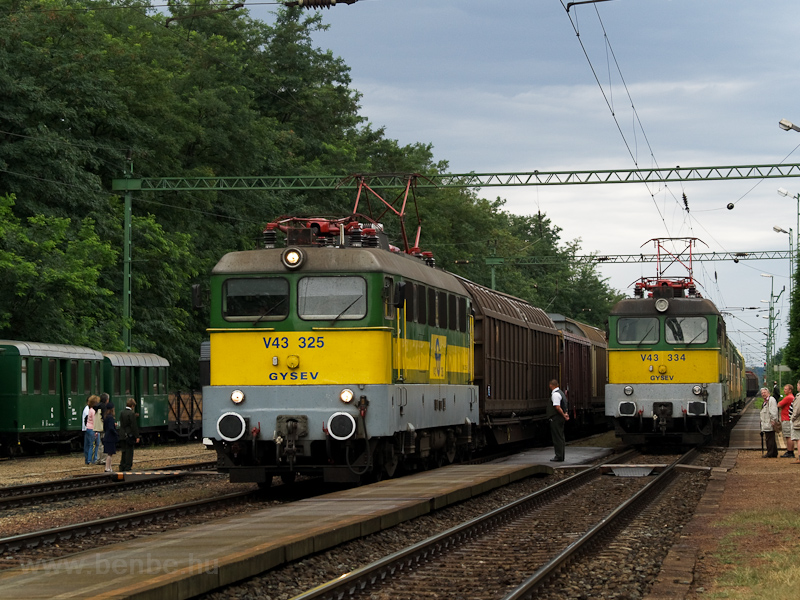 The GYSEV V43 325 is seen hauling a freight train and the V43 334 returning to Sopron at the end of a slow train at Fertőboz station photo