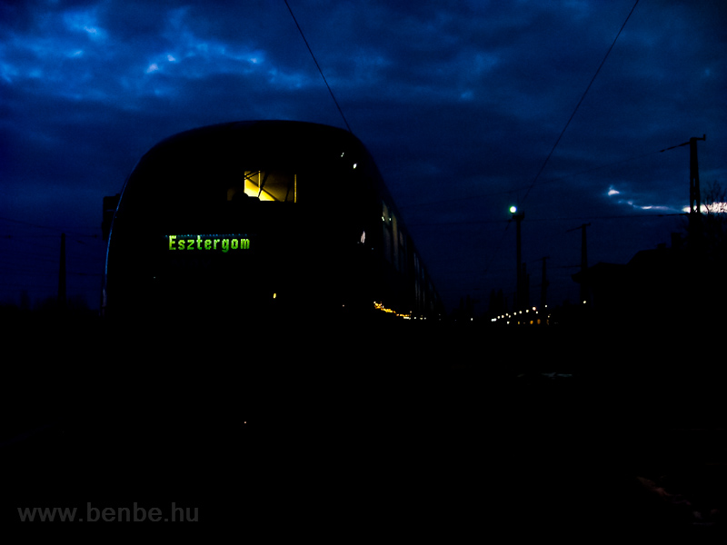 The MV 6342 006-1 Desiro railcar is seen waiting for a train to pass it at buda station at dawn photo