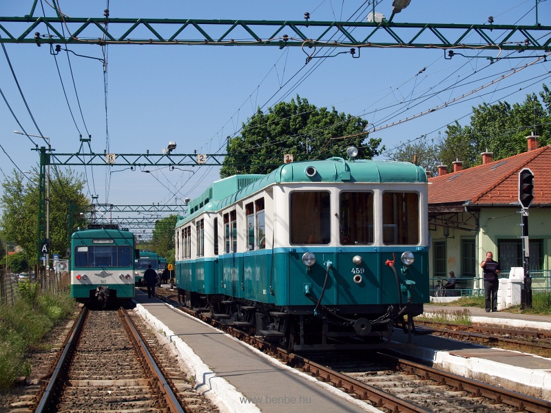 Regular passenger trains cross photo