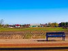 Bench and landscape at Tiszatenyő station