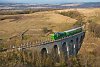 The CFR Calatori 69 0003-4 seen between Bradisoru de Jos and Oravita on the Kosovicza-viaduct