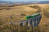 The CFR Calatori 69 0003-4 seen between Bradisoru de Jos and Oravita on the Kosovicza-viaduct