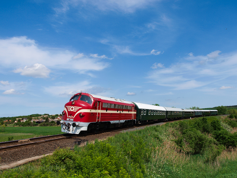 The M61 001 is seen hauling a historic train between Fle stop and Csajg station photo