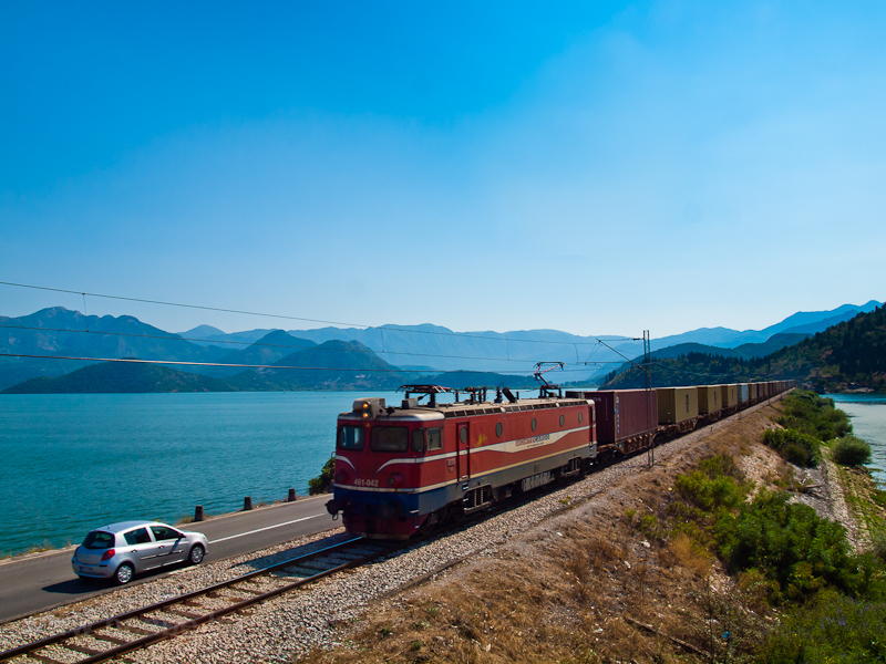 The MonteCargo 461-042 seen between Virpazar and Vranjina hauling a container train from the harbour of Bar across Lake Skadar photo