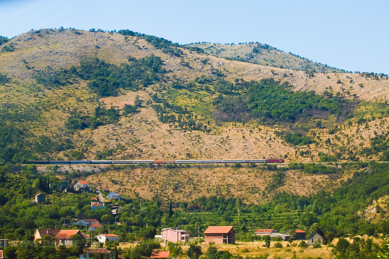 A Serbian Railways 461 is seen next to Podgorica with the Subotica-Bar night train near Bioce photo