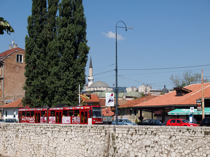 Sarajevo - tram at the bank of the Miljacka river photo
