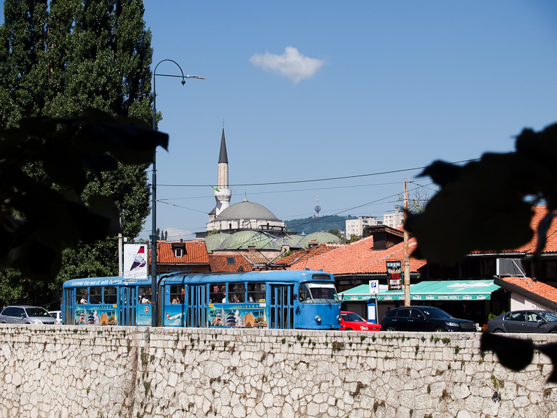 Sarajevo - tram at the bank of the Miljacka river photo
