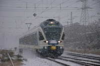 An unidentified MÁV-START 415  seen between Kőbánya-Kispest and Pestszentlőrinc in a thick snow