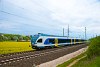 The MV-START 415  061 seen between rm and Solymr with late spring rapeseed blooming in the background