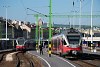 The red MÁV-START 415 024 and 415 033 Stadler FLIRT multiple units seen at Budapest-Déli