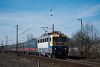 A MÁV-START 630 143 Szemeretelep megállóhelyen üres konténerszállító tehervonattal