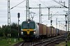 The GYSEV 471 006 seen hauling a container train at Kny station