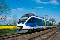 The MÁV-START blue Bombardier Talent EMU 425 003 seen between Öttevény and Abda