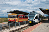 The MÁV-START 117 290 diesel railcar and the 415 062 blue Stadler FLIRT electric multiple unit seen at Esztergom-Kertváros
