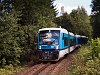 The ČD 840 003-8 seen between Kořenov zastvka and Desn-Pustinsk