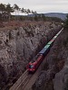 The BB 1216 150 is hauling a container train between Prešnica and Črnotiče