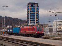 The ŠZ 541 013 is seen hauling a freight train from Koper at Ljubljana