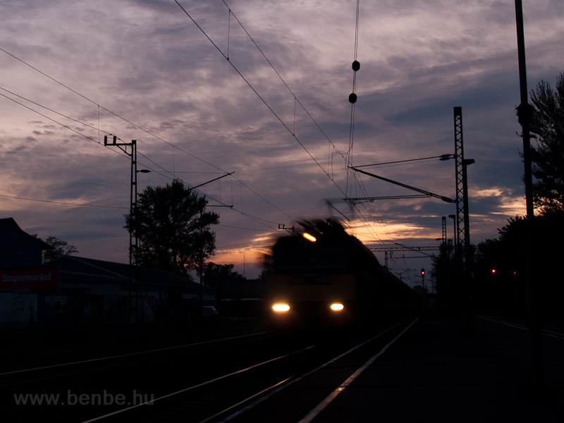 A V43 is passing through Balatonfenyves station by sunset photo