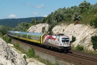 The GYSEV/Raaberbahn <q>Joseph Haydn Taurus</q> (1047 504-4) near Szr with an IC from Sopron and Szombathely