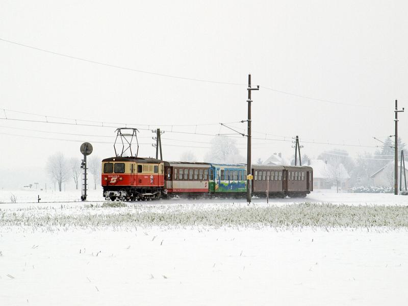 The BB 1099 016-6 narrow gauge electric locomotive with a short passanger train near Ober Grafendorf photo