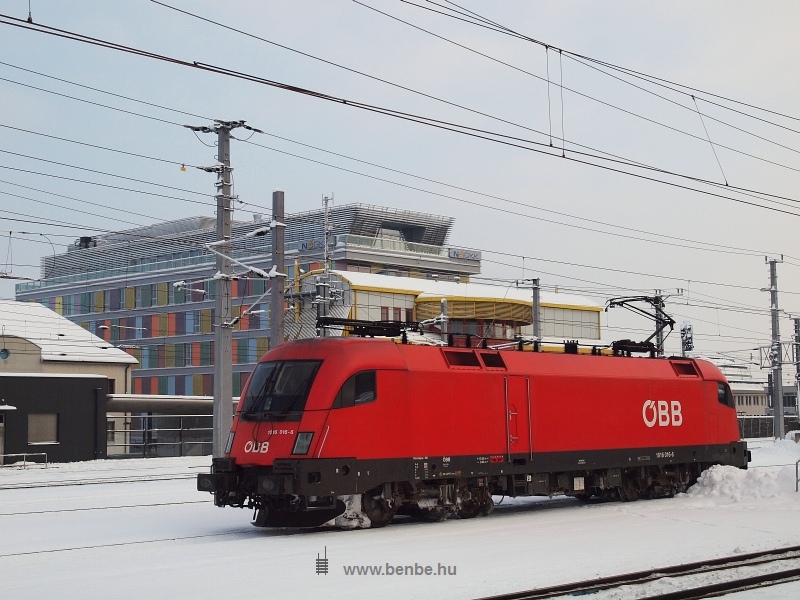 The BB 1016 016-6 passing station St. Plten alone with the modern Stellwerk in the background photo