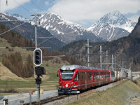 The RhB ABe 8/12 3504 is seen hauling an EngadinStar REX at Zernez station during its reconstruction