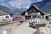 The RhB ABe 8/12 3504 is seen hauling an EngadinStar REX at Zernez station during its reconstruction