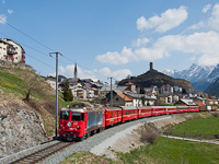 The RhB Ge 4/4<sup>II</sup> 617 is seen hauling a nice mixed passenger-freight train at Ardez station