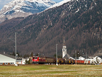 The RhB Ge 6/6<sup>II</sup> 706 is seen hauling a freight train in Val Bever