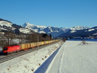 The ÖBB 1116 225-2 pulling a freight train near Kirchberg in Tirol