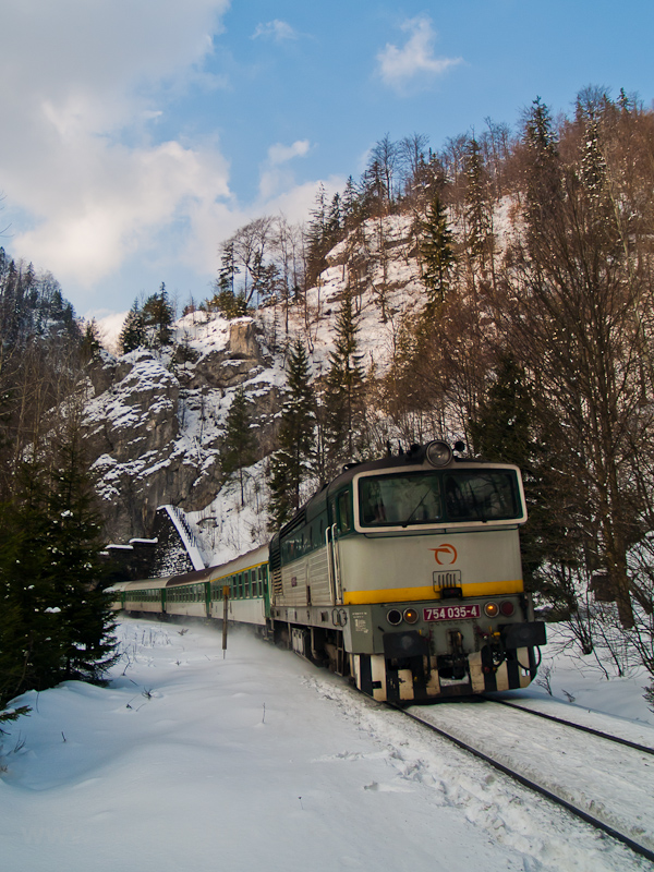 The ŽSSK 754 035-4 is seen hauling the fast train Streűno to Bansk Bystrica between Čremošn and Harmanec Jaskyňa on the Bansk Bystrica side of the main tunnel, between two shorter tunnels photo
