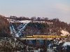 It's probably the 754 035-4 hauling the Czech consist back to Žilina under the name Rozsutec. The photo has been taken at Kostiviarsky viadukt between Kostiviarska and Ul'anka stations.